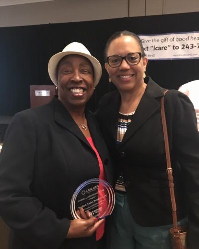 Dr. Ophelia Garmon-Brown (co-founder) and Carolyn Allison (CEO) at award ceremony